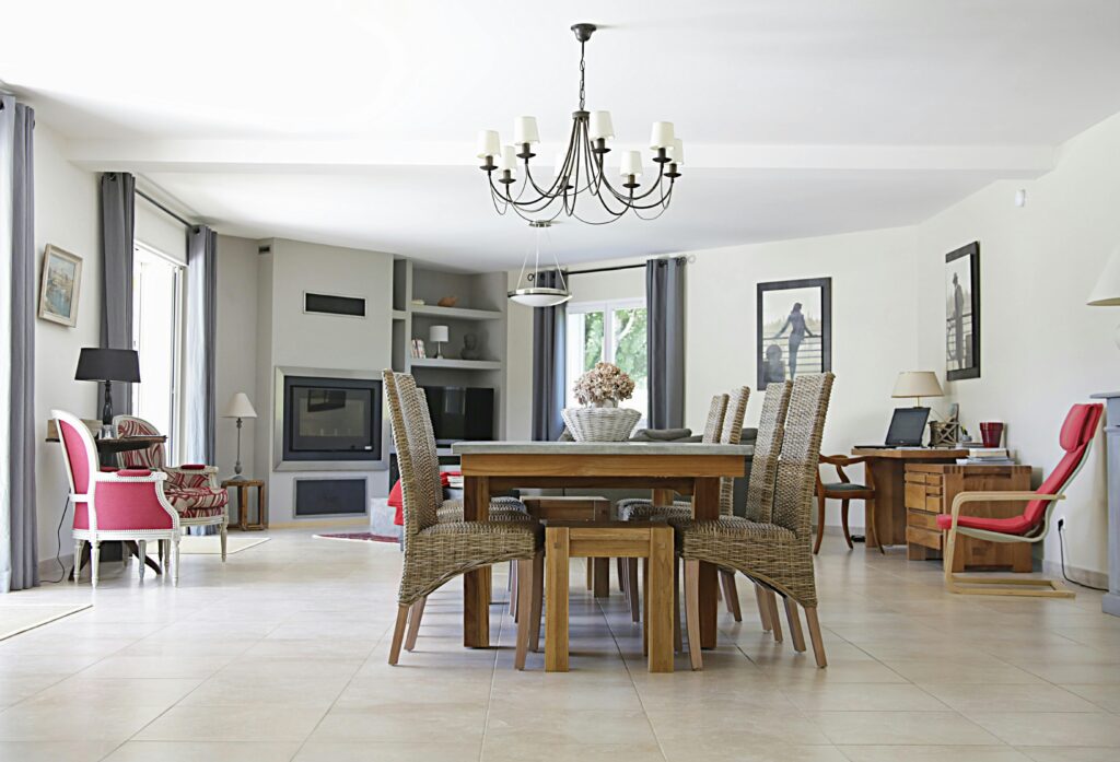 Rectangular Brown Wooden Dining Table and Six Gray Chairs Indoors